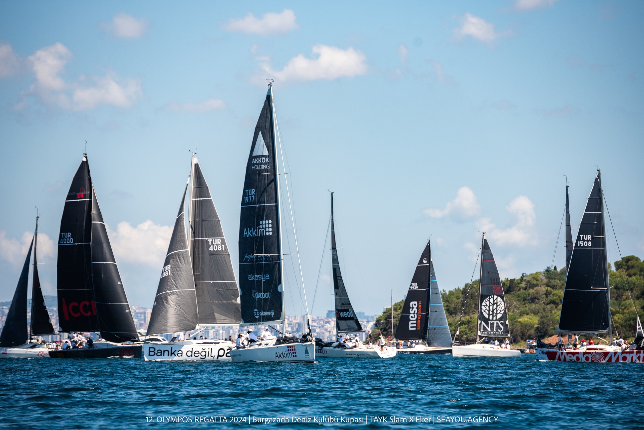 TAYK SLAM-EKER OLYMPOS REGATTA YELKEN YARIŞLARI, TÜM HIZIYLA DEVAM EDİYOR: